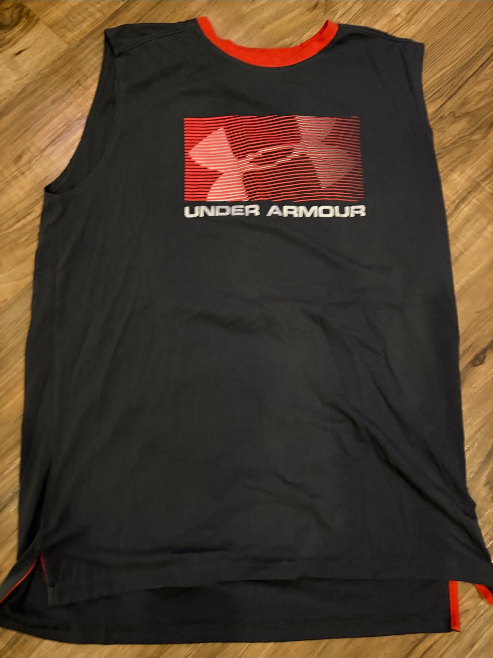 Under Armour Men’s Black Sleeveless Training Tank with orange Accents